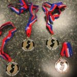 This is a photo of Alice's four medals